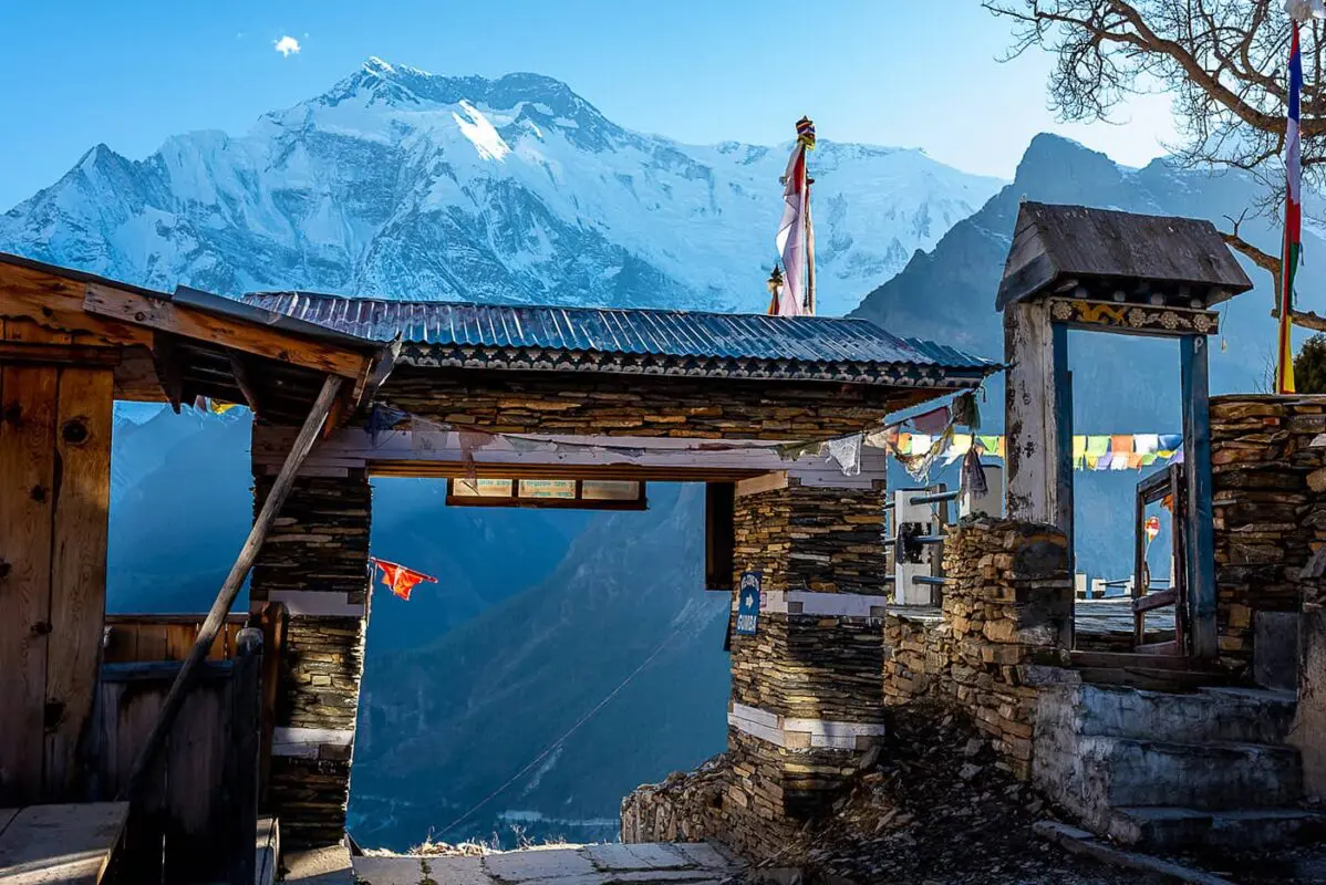 stone gate with mountains in background