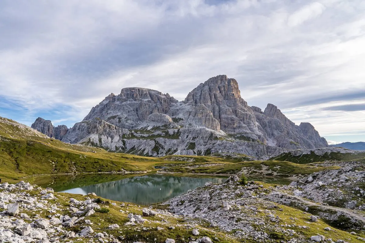 body of water in front of mountain