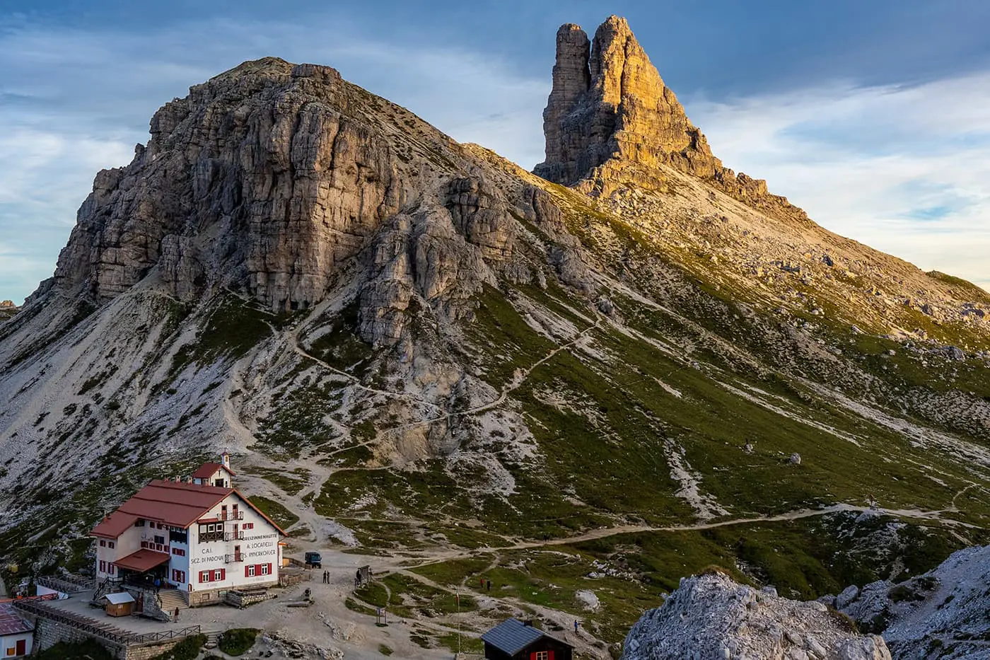 Mountain hut near rugged peaks