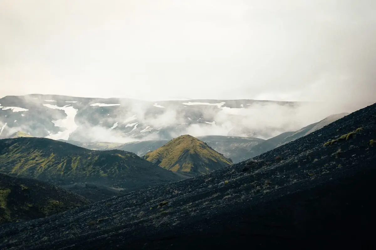 black sand dunes in moody weather