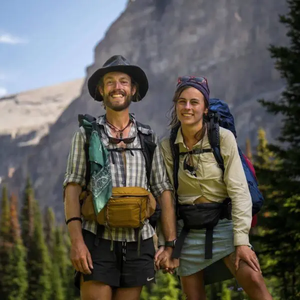 man and women posing for camera