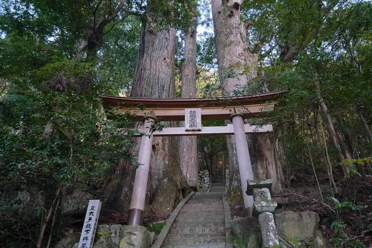 wooden arch on beginning of stone staircase