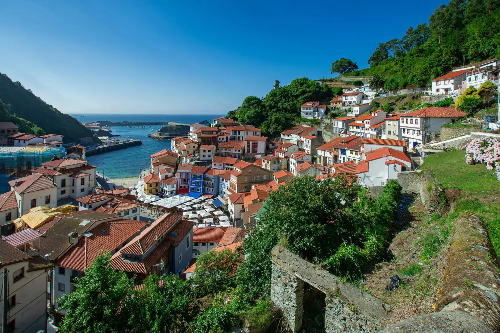 Coastal town with white houses and orange roofs