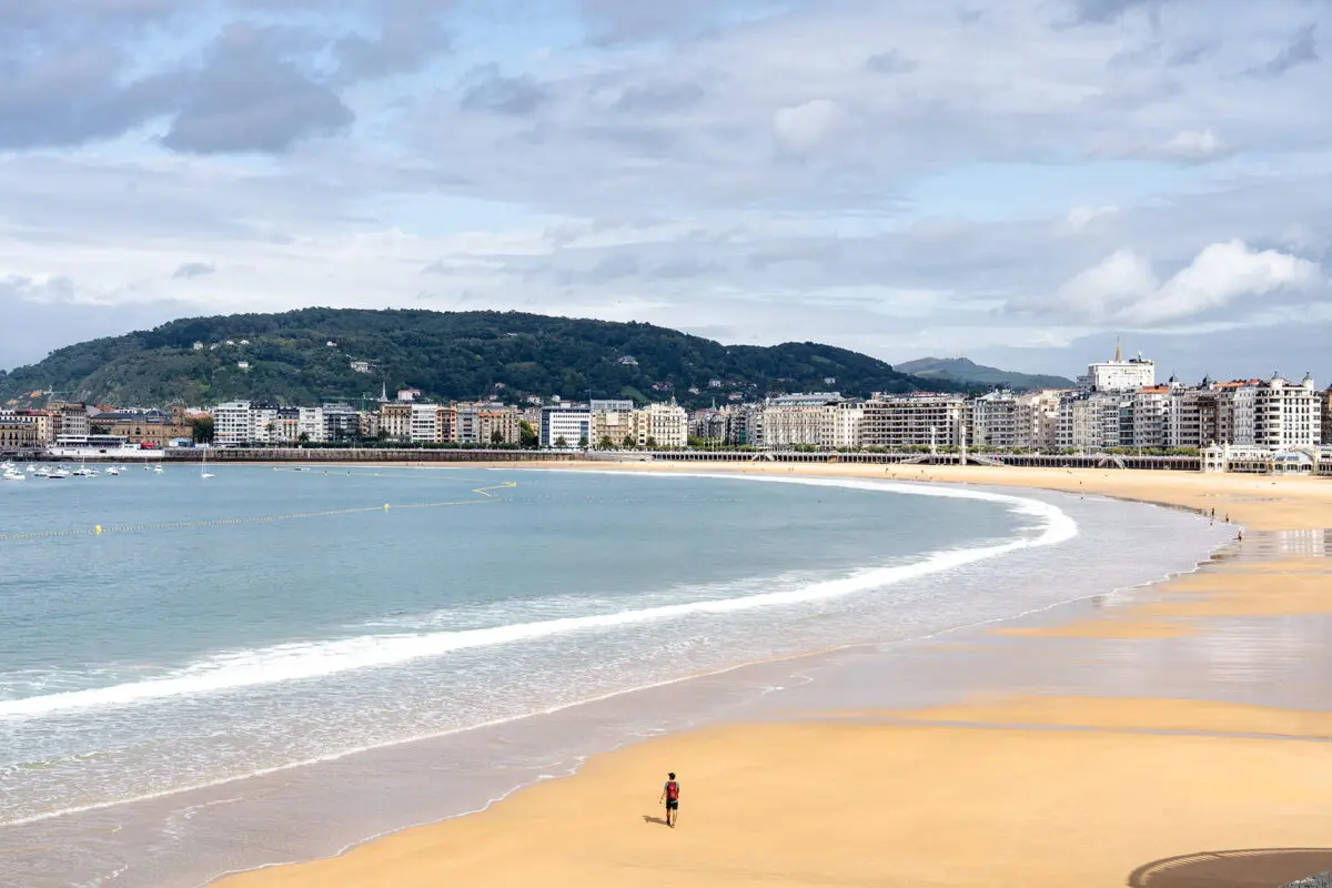 Man walking on the beach in Spain