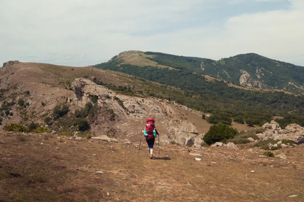 person hiking in the dry Pyrenees Orientales