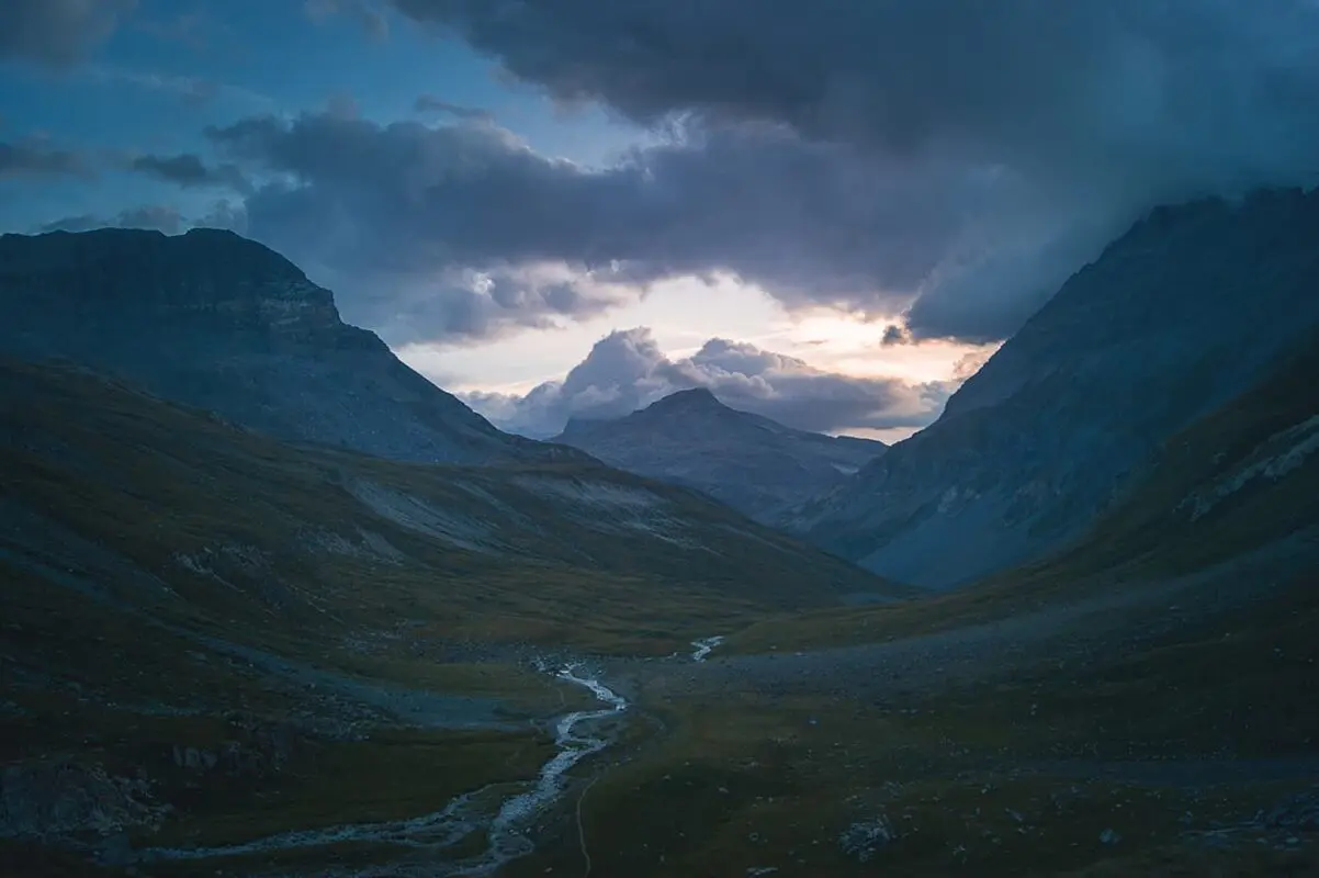 panoramic view of mountains in the alps during sunset