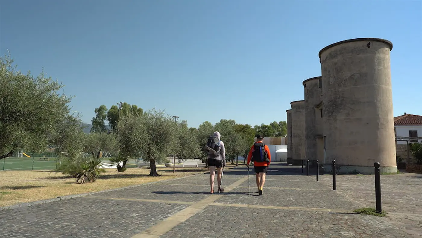 man and women hiking in urban area