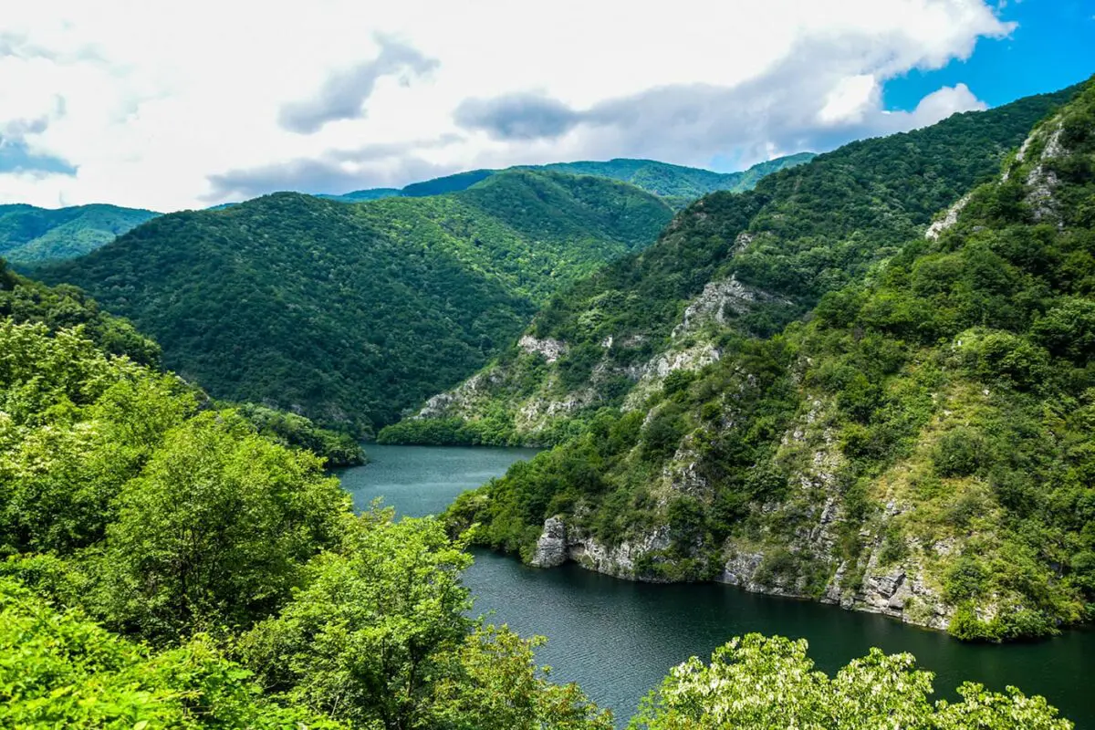 big river flowing through mountain valley