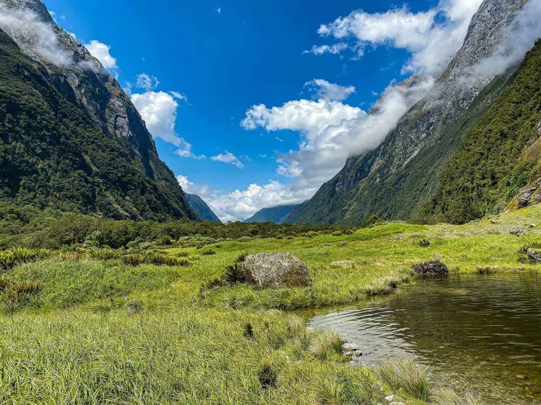 green landscape in mountain valley