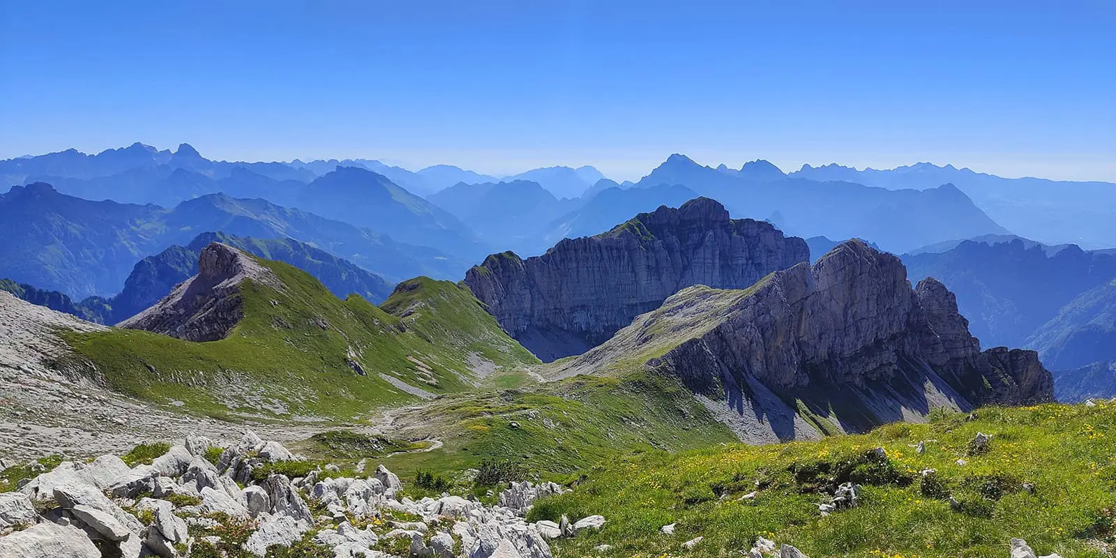 green landscape and rugged peaks on the Alta Via 1