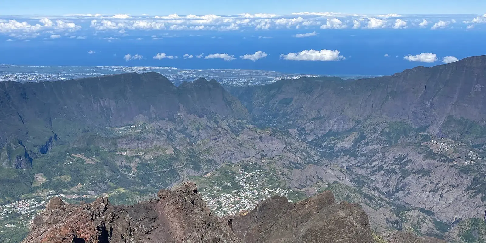 panoramic view of city in mountain valley on Reunion Island