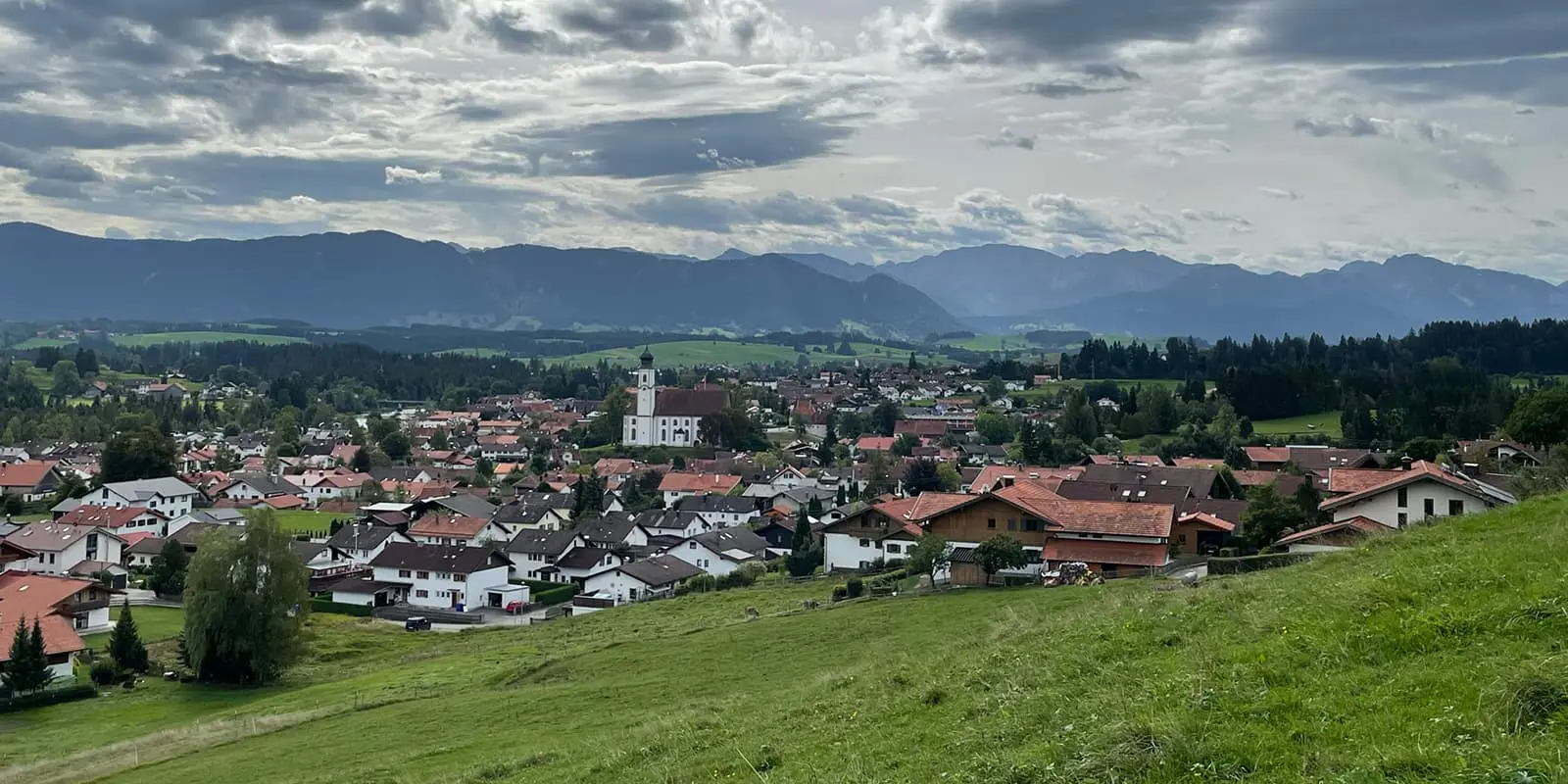 small german town with mountains in the background