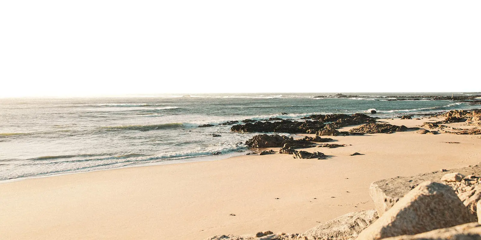 beach in portugal during sunset