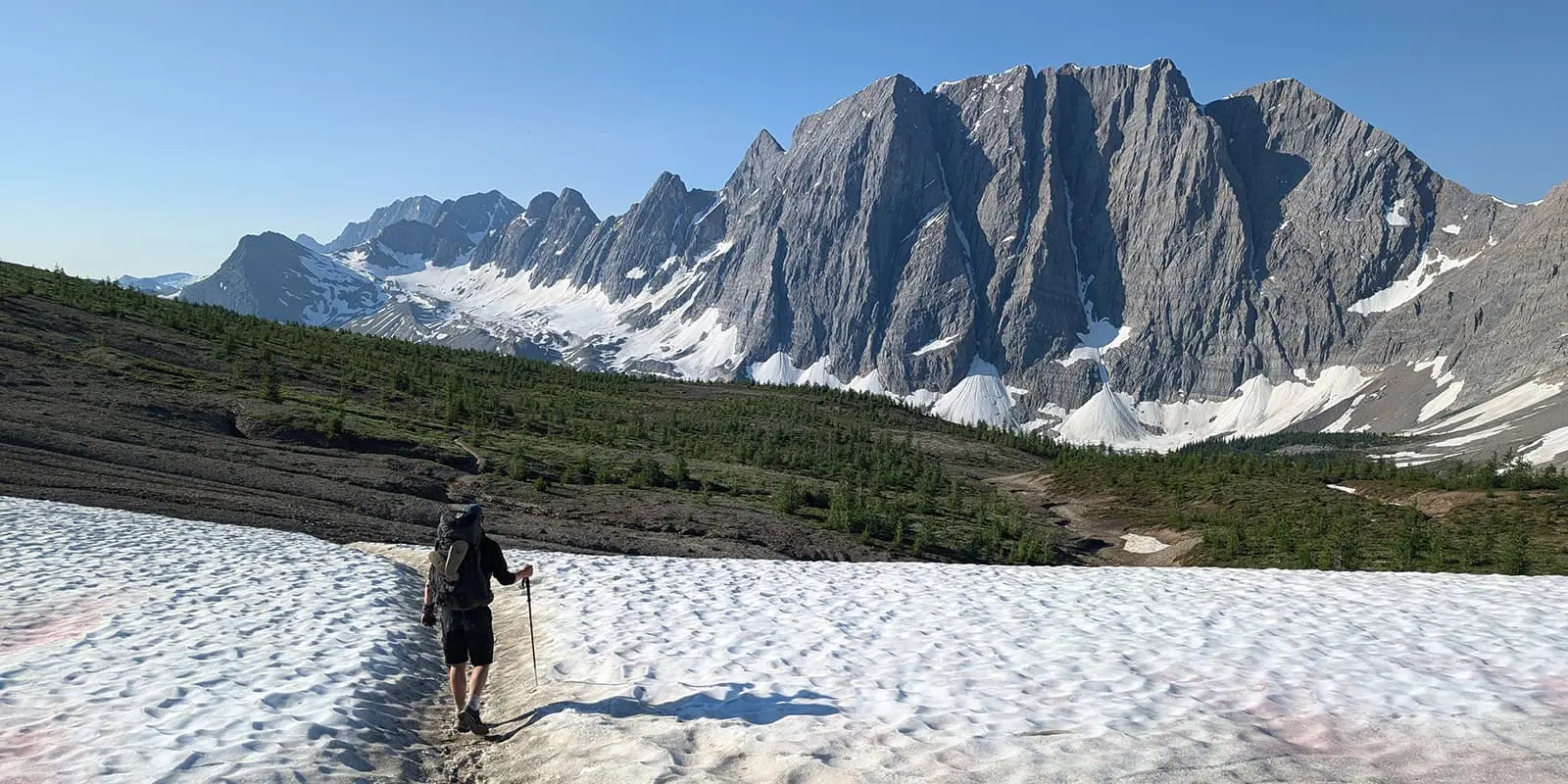 person hiking on the Rockwall trail in Canada