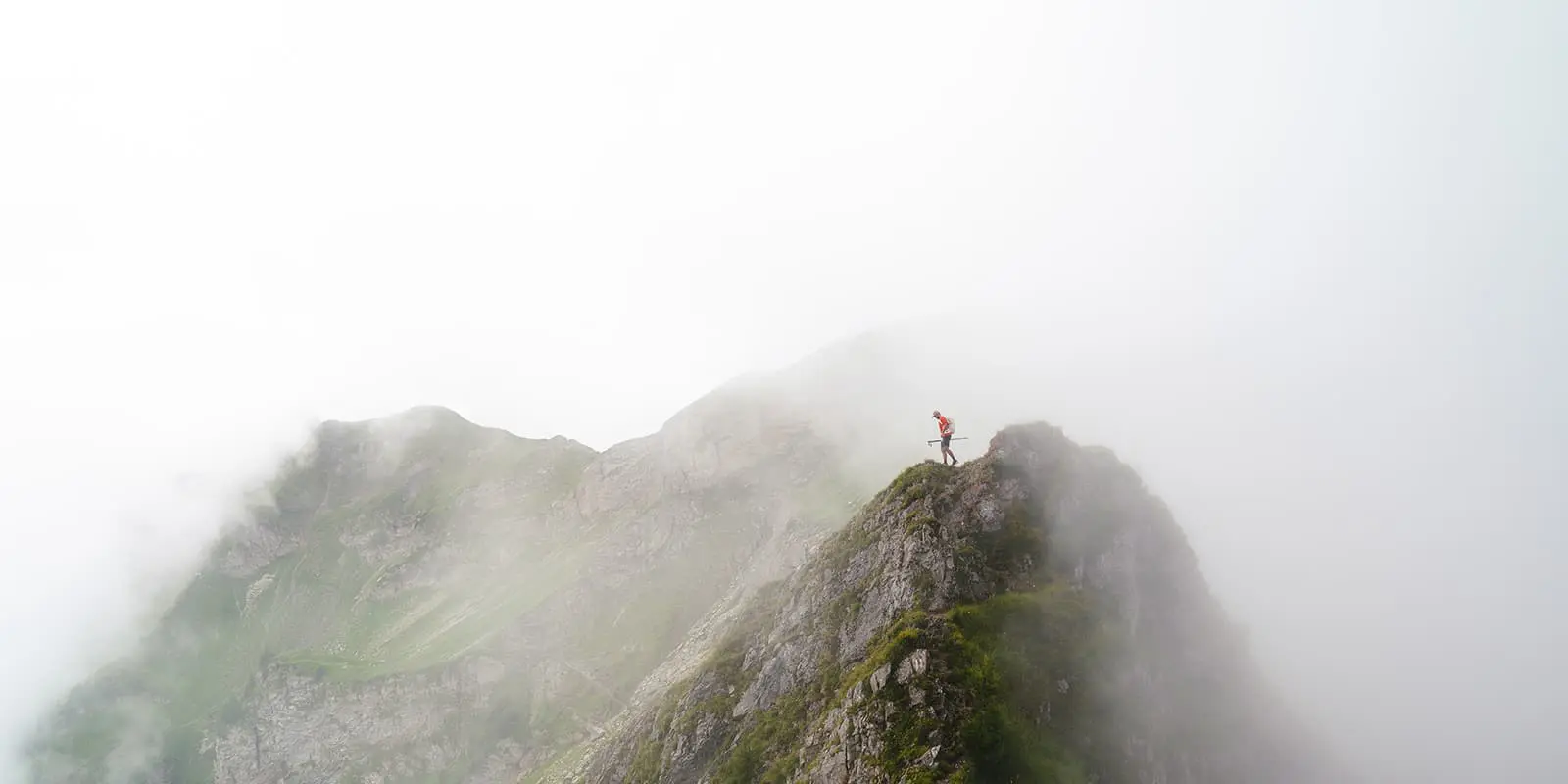 man standing on top of mountain in Liechtenstein