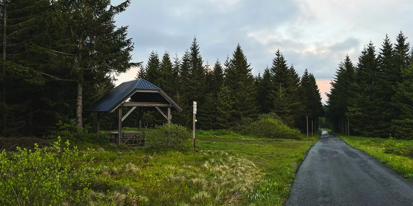 hiking trail near aspalt road in czech republic