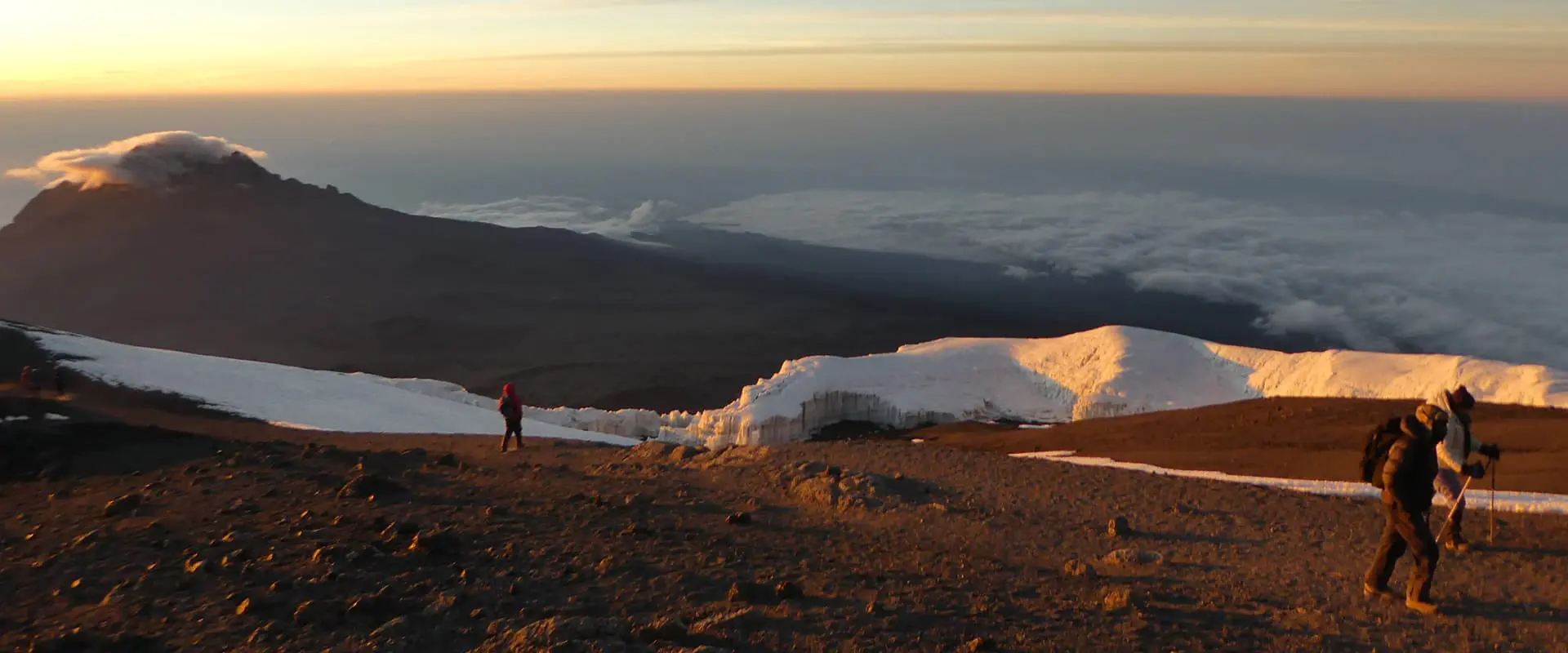 hikers climbing Kilimanjaro