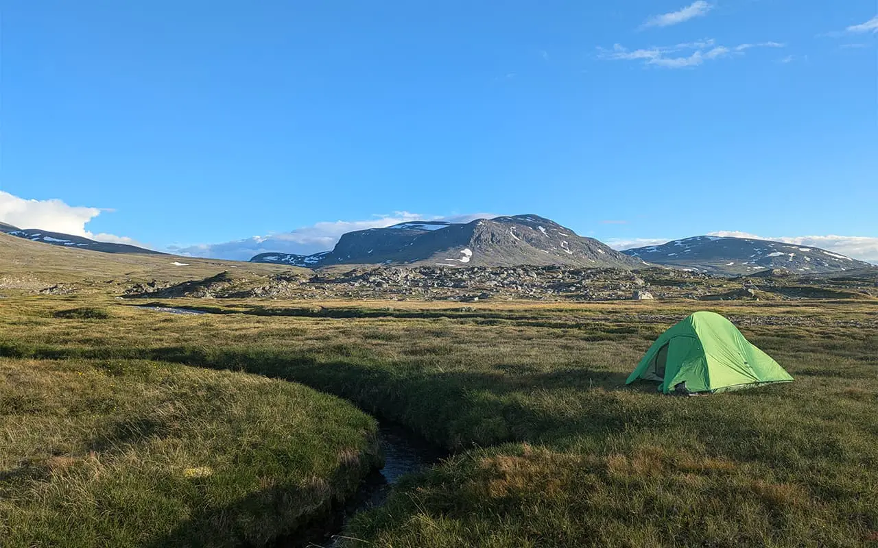 green tent pitched in Swedish lapland on the kungsleden