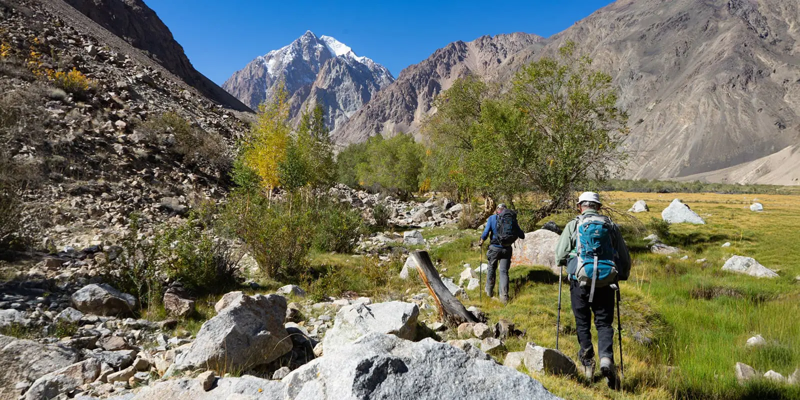 persons hiking on the Pamir Trail in Tajikistan