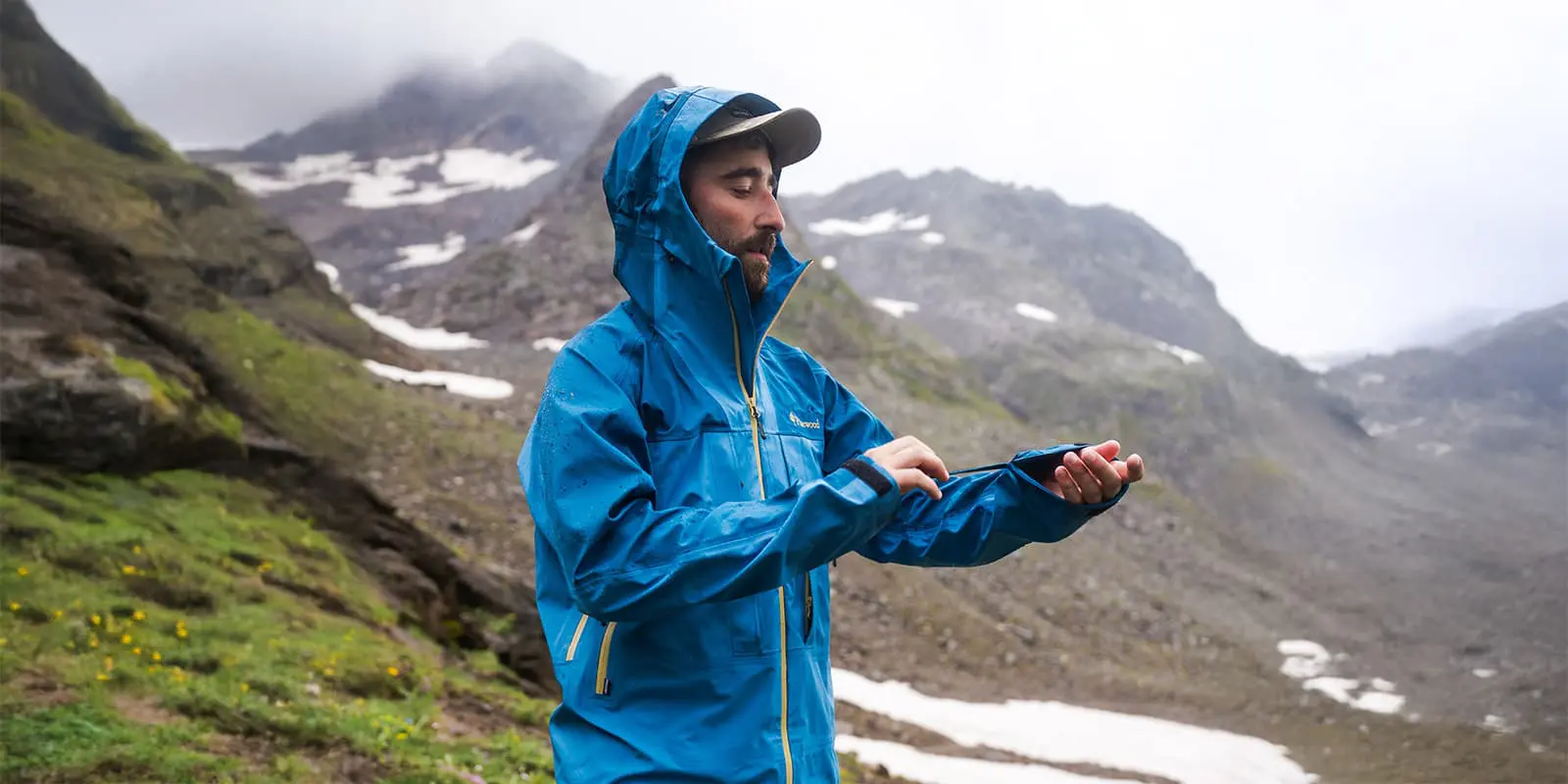 person wearing a blue Pinewood Abisko 3L jacket