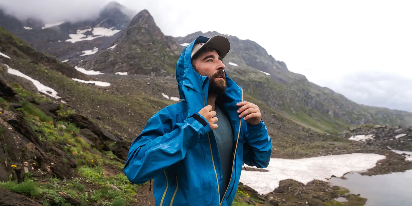 person wearing a blue Pinewood Abisko 3L jacket