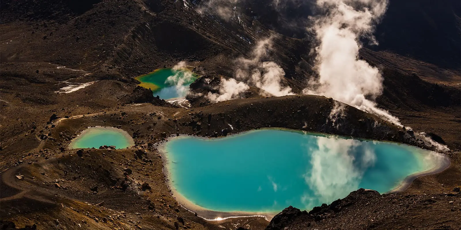 blue lakes in volcanic landscape