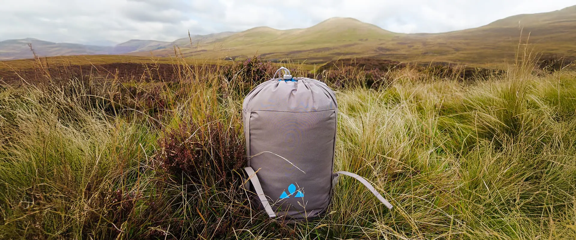 Vaude sleeping bag sitting in the grass