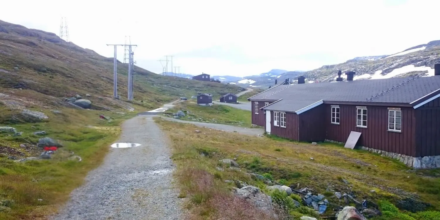 gravel road leading up to mountain hut