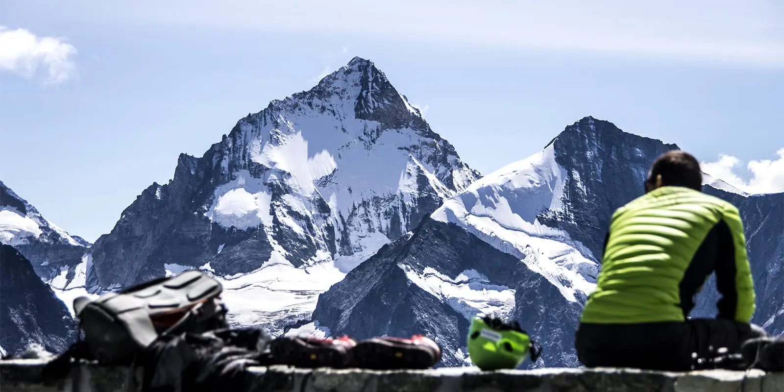 person looking at the Bishorn mountain top in Switzerland