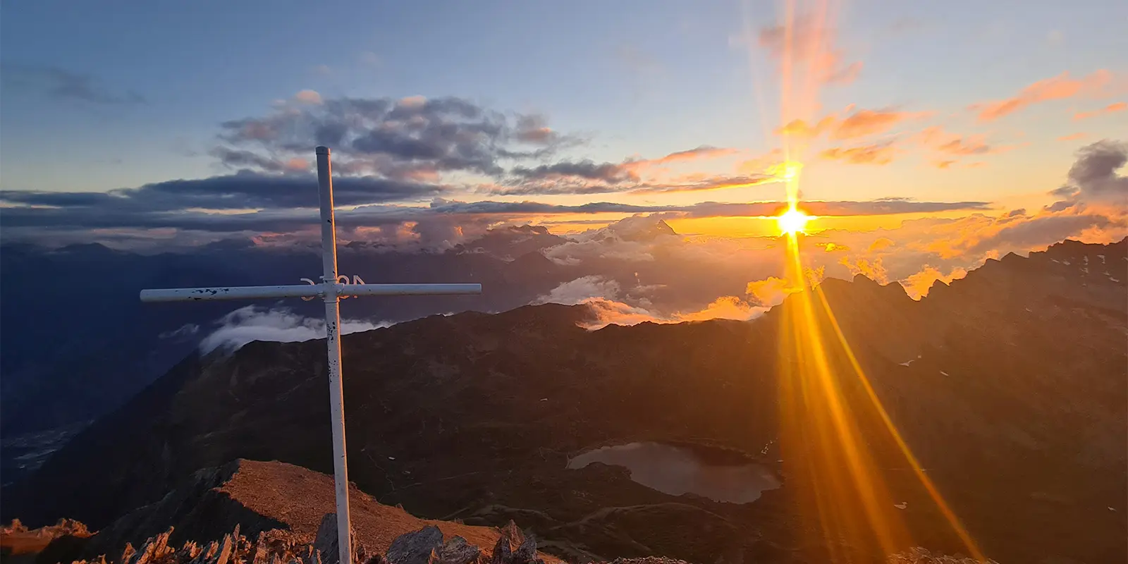 sunrise on top of Swiss mountains