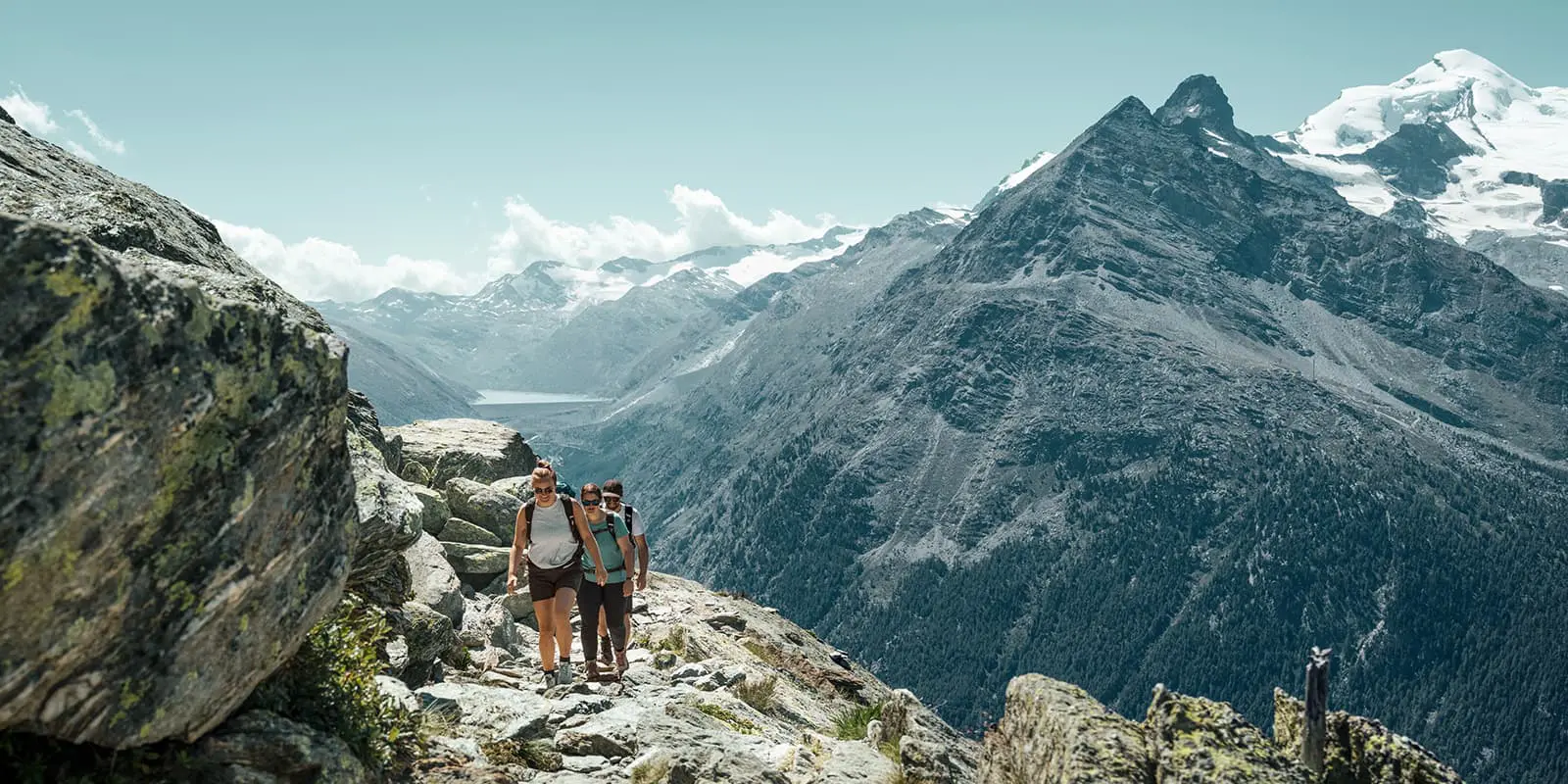group of hikers on the Almagell high altitude trail in Saastal