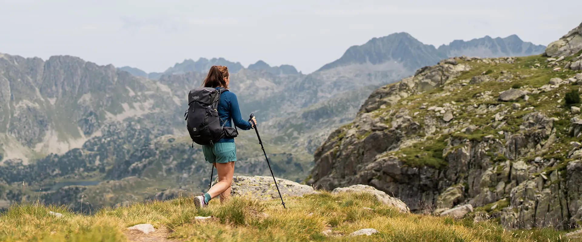 person hiking in the Catalan Pyrenees with RAB Exion ND35L backpack