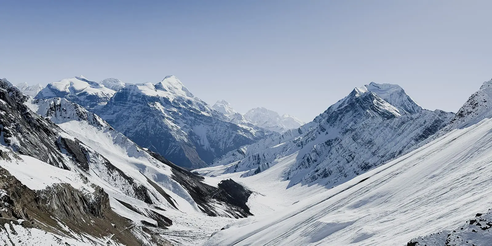 snow covered mountains of Nepal on the Nar Phu Valley Trek