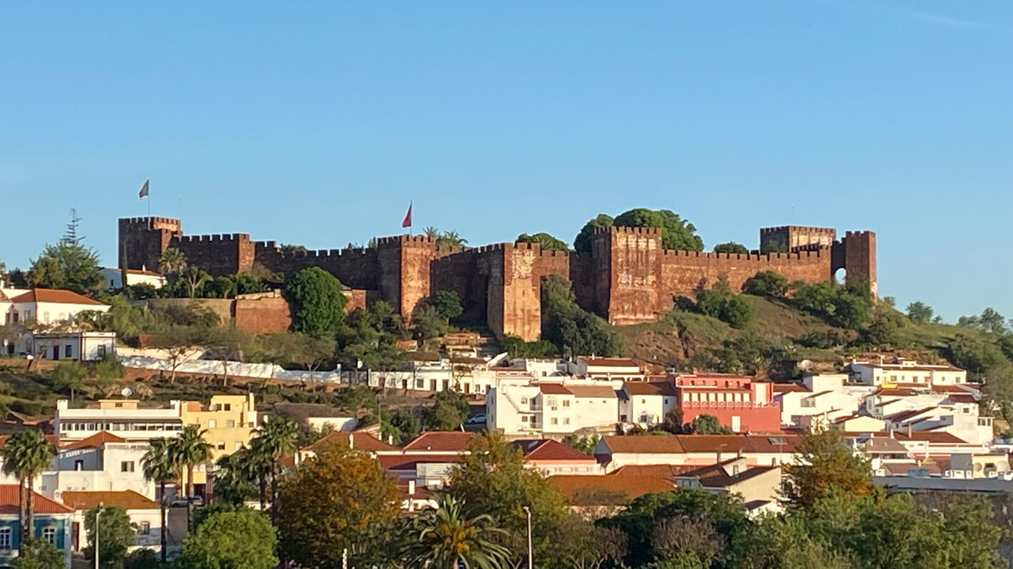 View of historic building in town in the Algarve during sunset