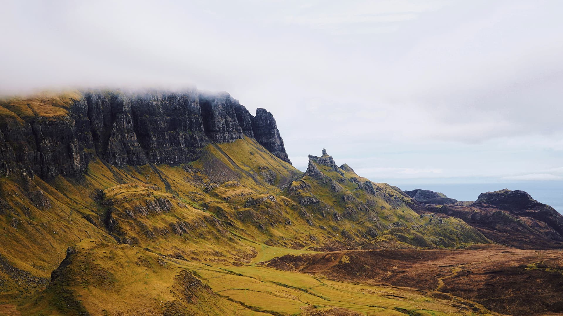 Rugged mountains in cloudy weather. 