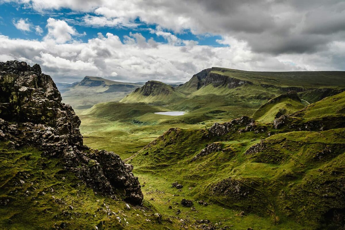 lush green landscape with rugged peaks