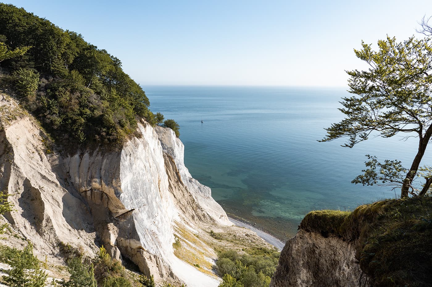 white cliffs near body of water