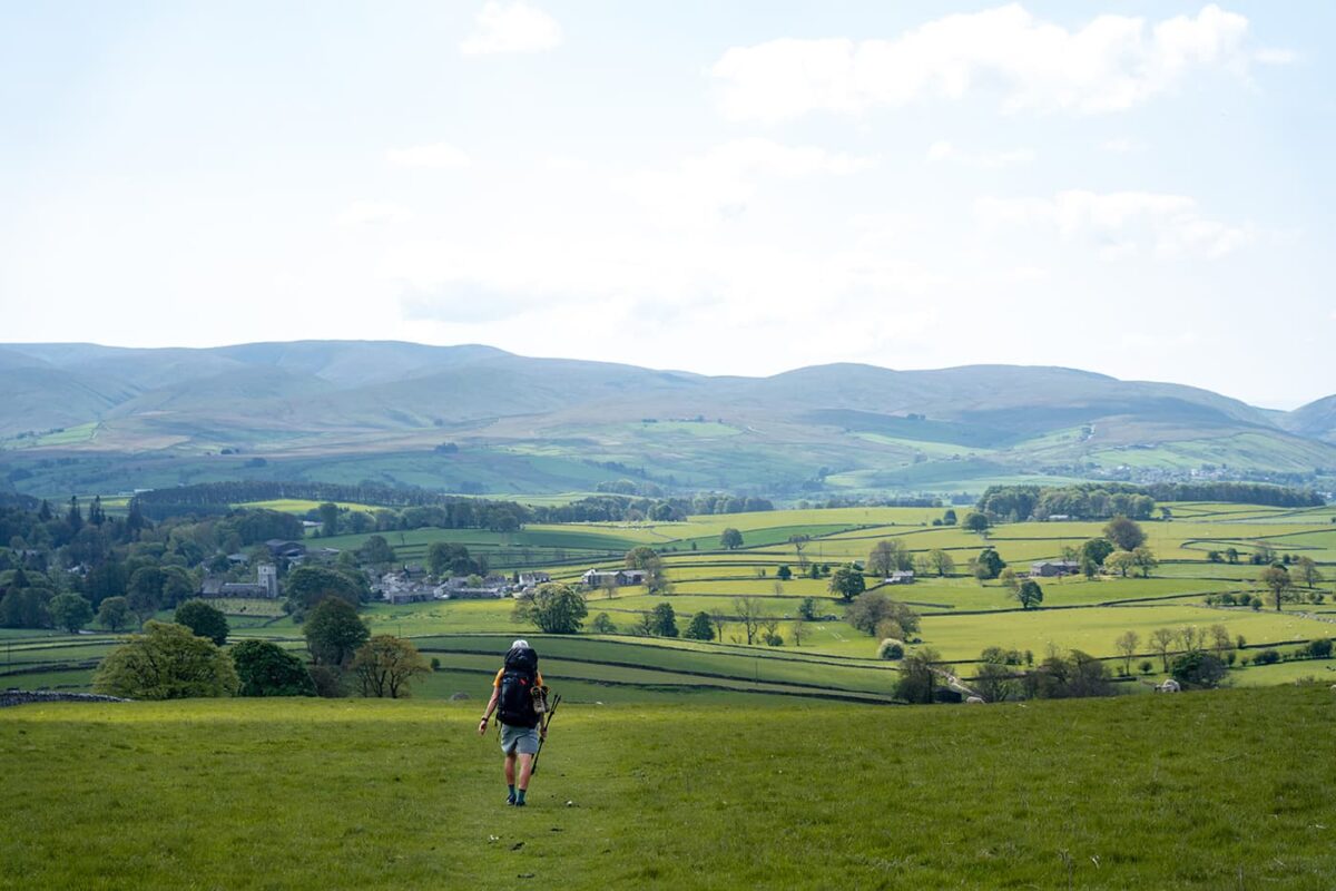 person hiking in English countryside