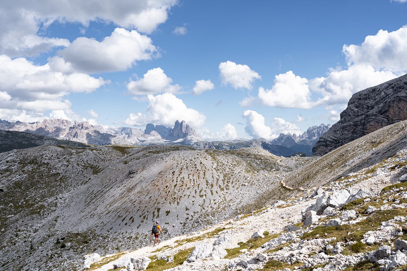 Person on hiking trail in the Dolomites mountains