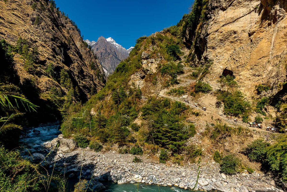 river flowing through mountain valley