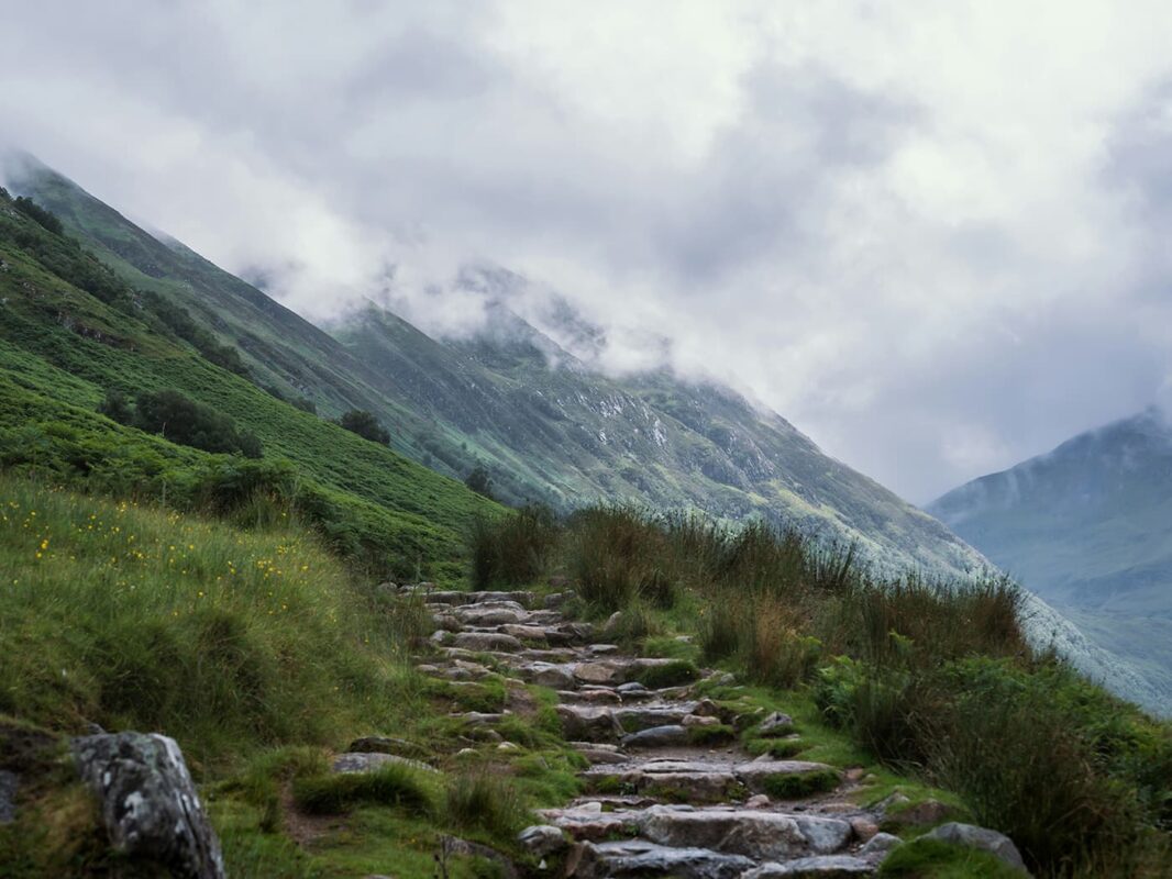 stone pathway leading up to hill