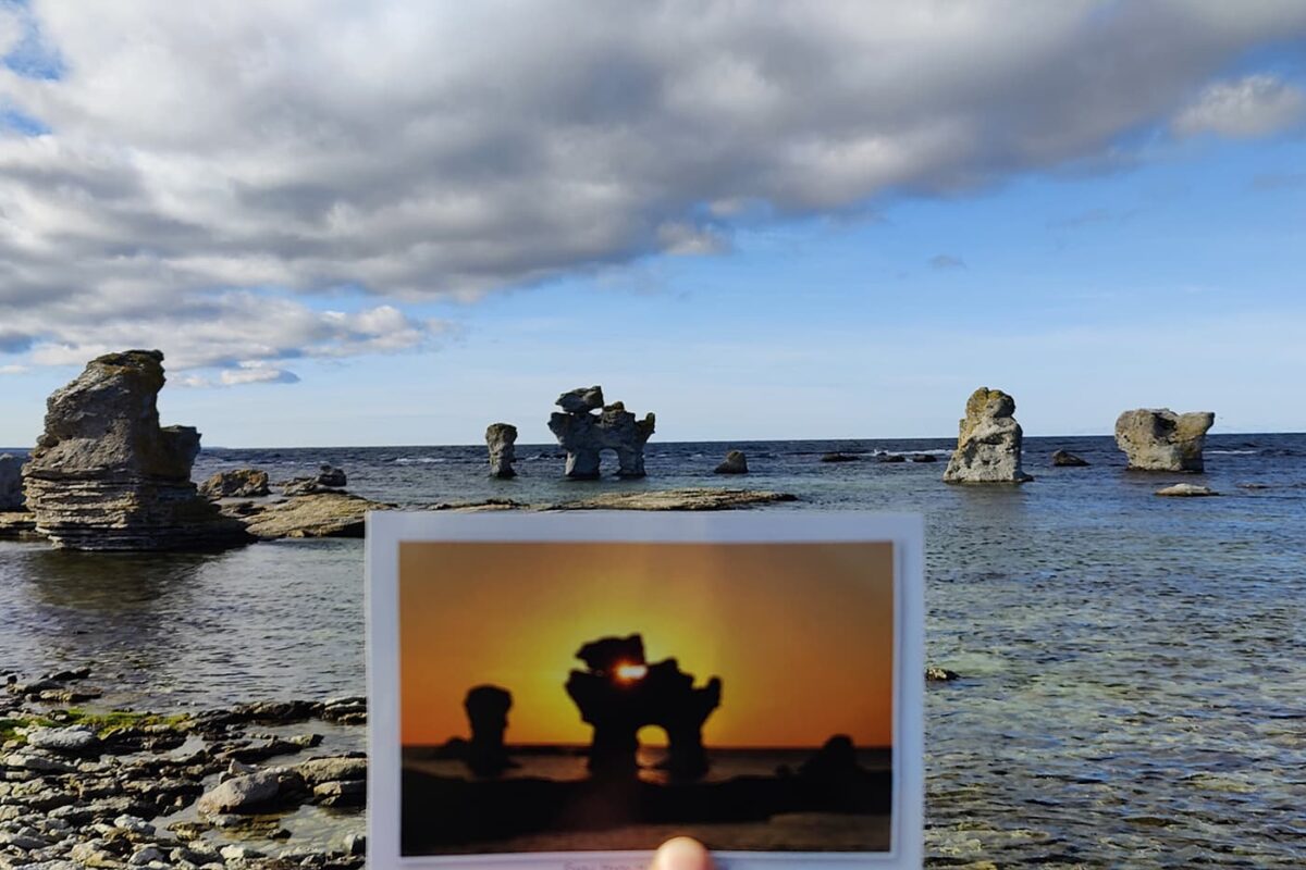 rocky formations in body of water