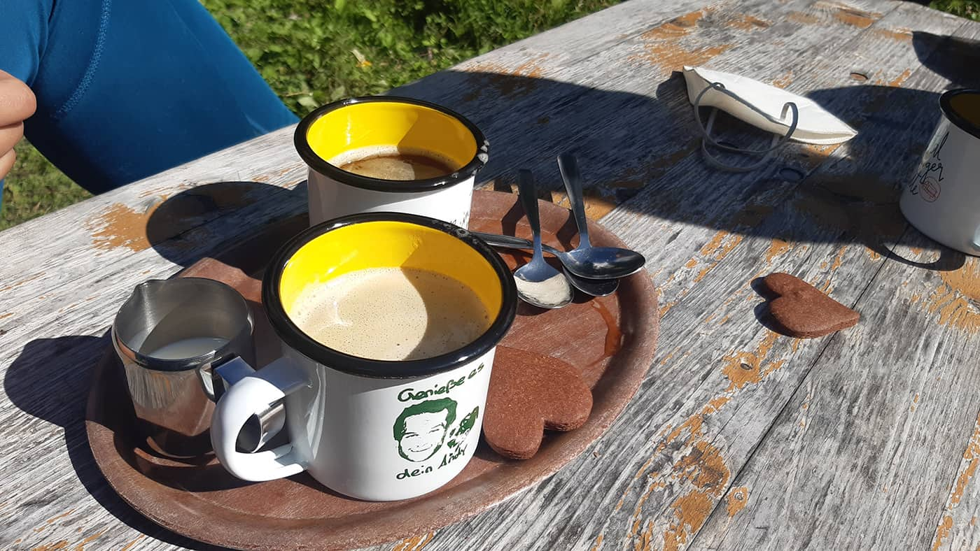 two coffee on picknick table