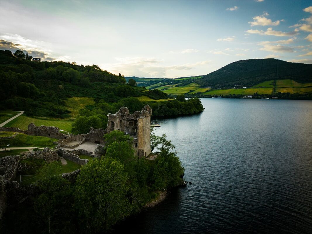 old ruin of castle near body of water