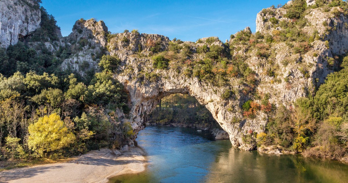 The natural landmark Pont d´Arc at the Gorges de l'Ardeche in Vallon (France). A famous sightseeing and sports destination for kayaking and swimming.
