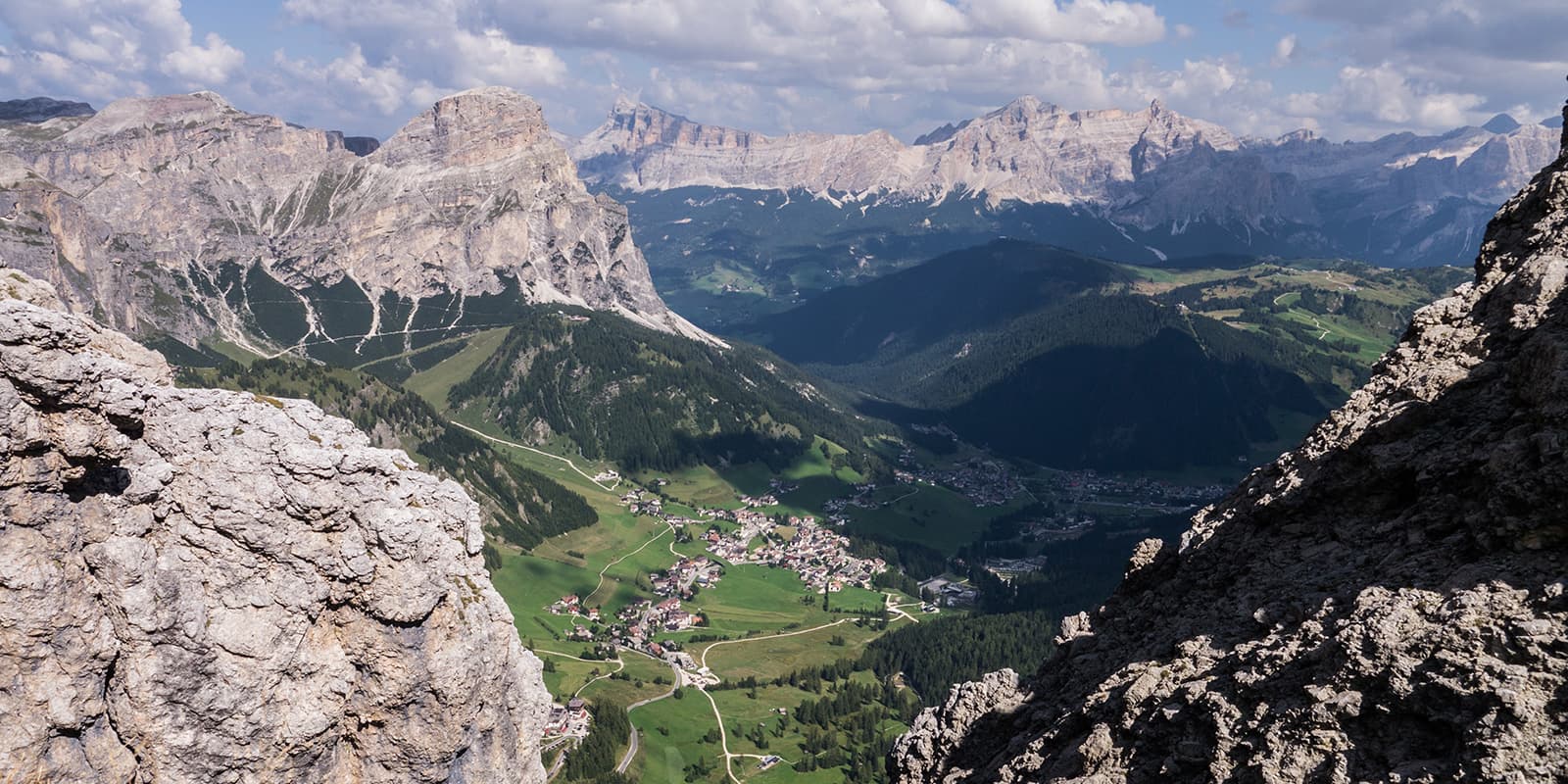 small town in mountain valley in the dolomites