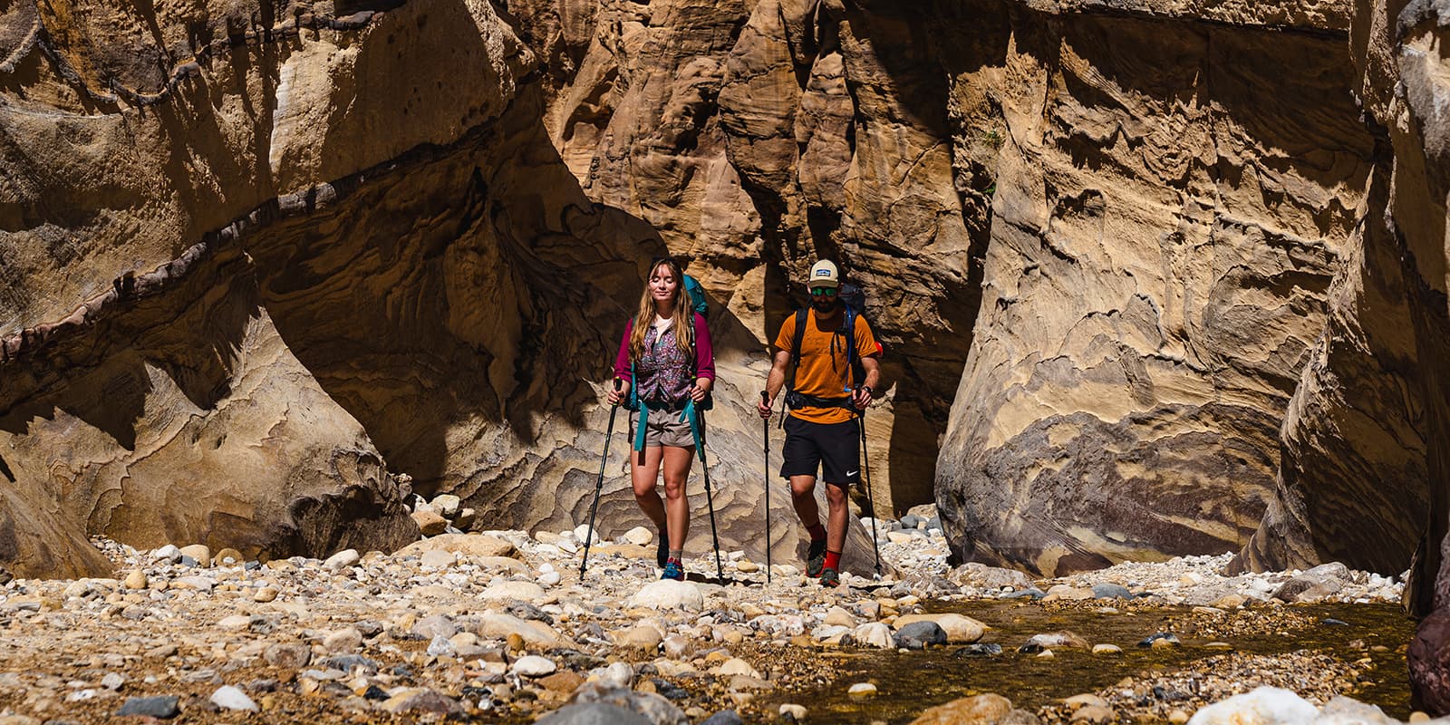 two person hiking in desert valley on Jordan Trail