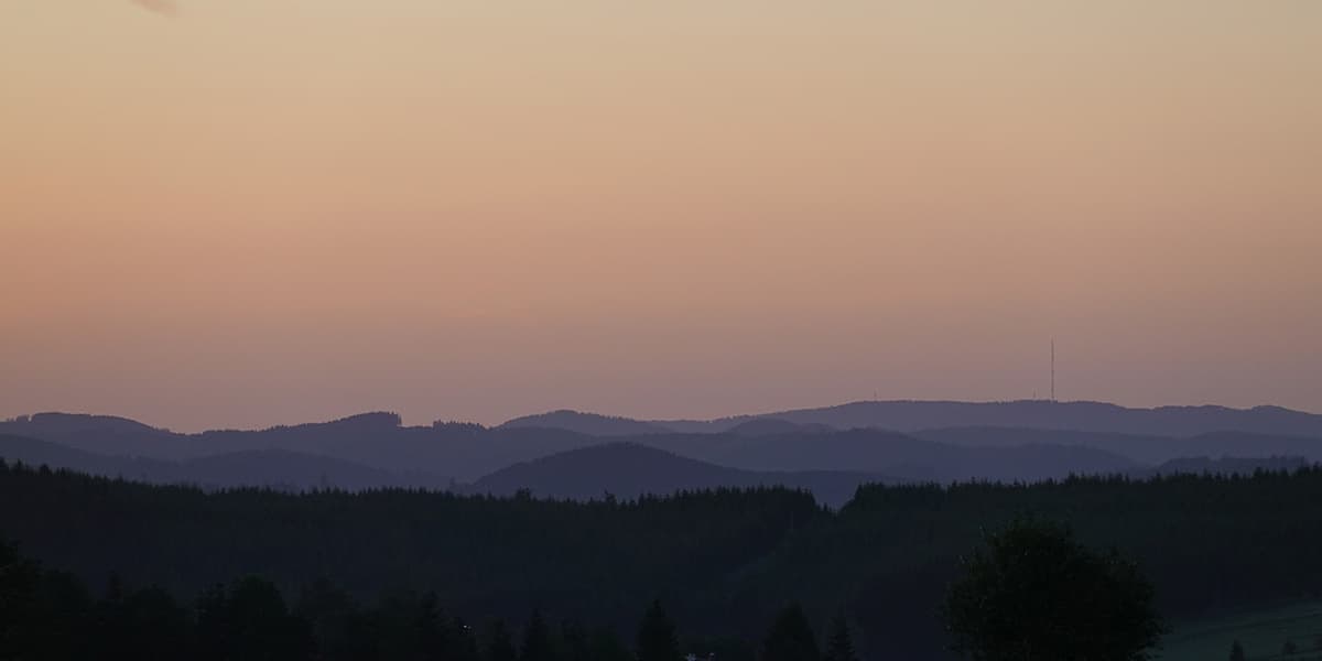 silhouet of mountains during sunset