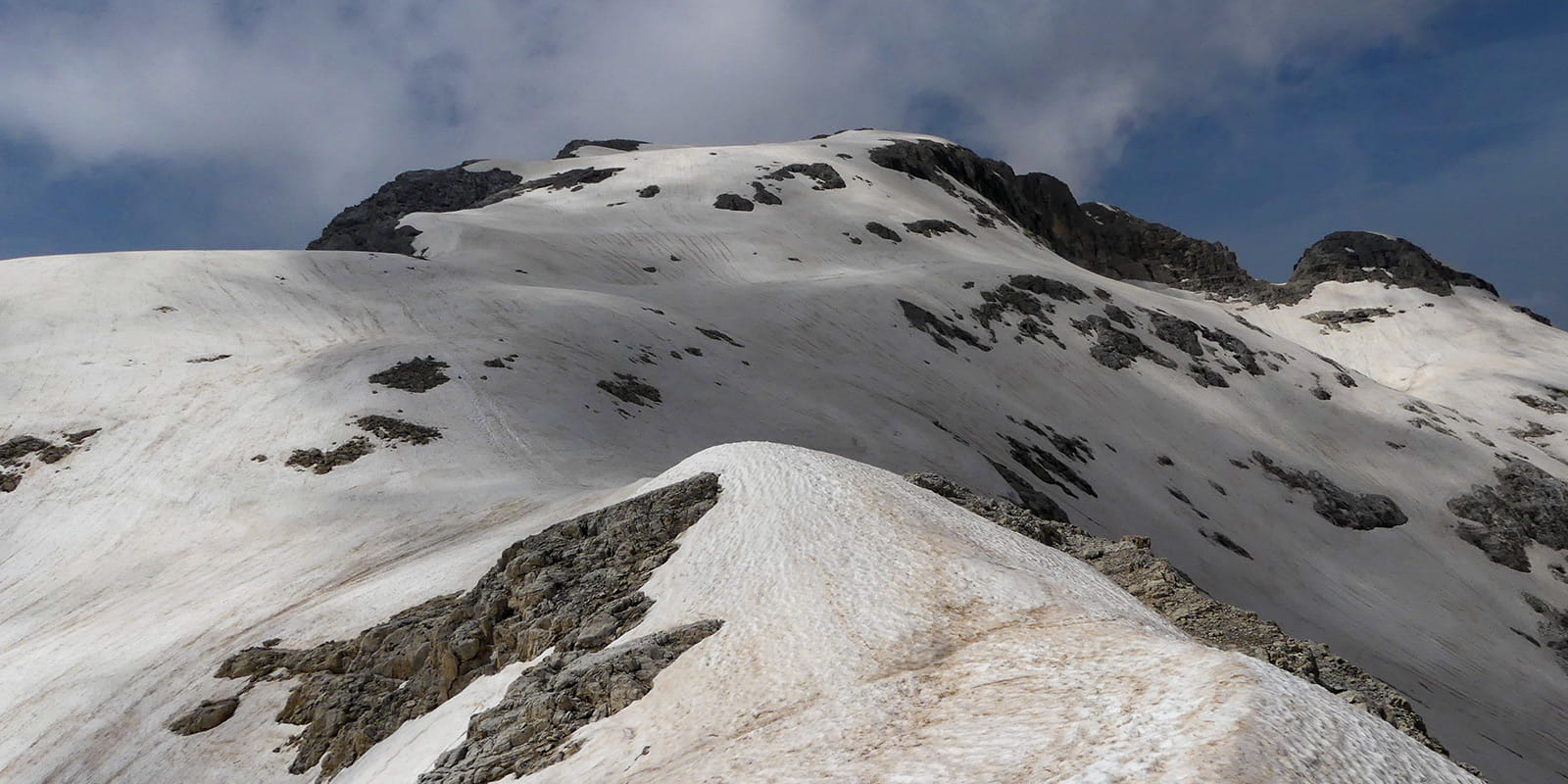 snow covered mountain peaks in the Dolomites mountains