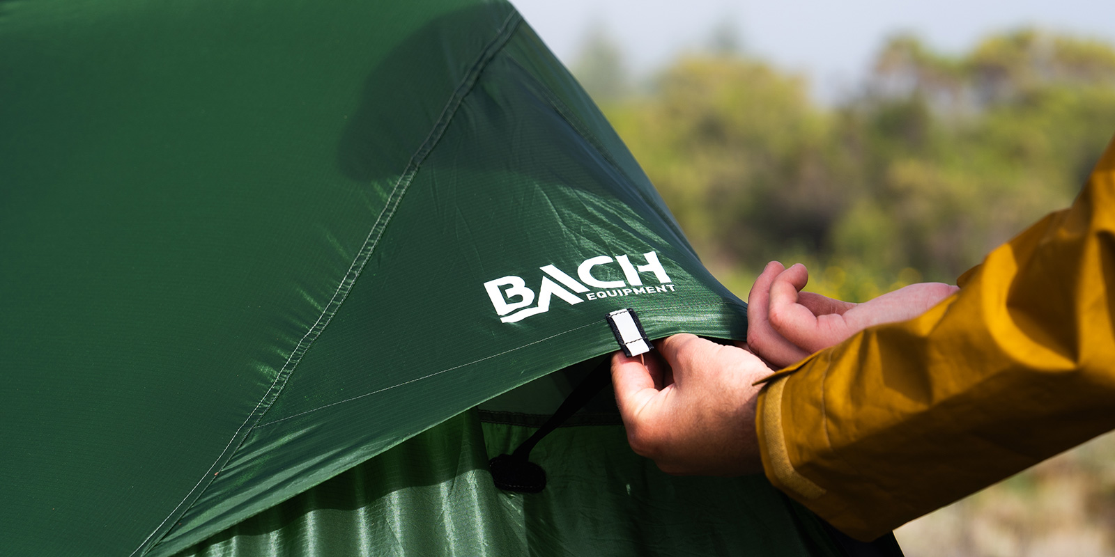 tent with Bach logo